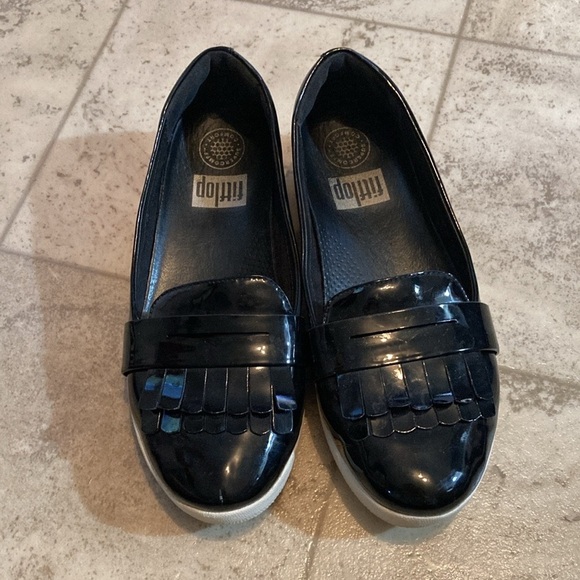 Fit flip black shiny frilly loafers style black shed with small mark on one toe. - Picture 1 of 10